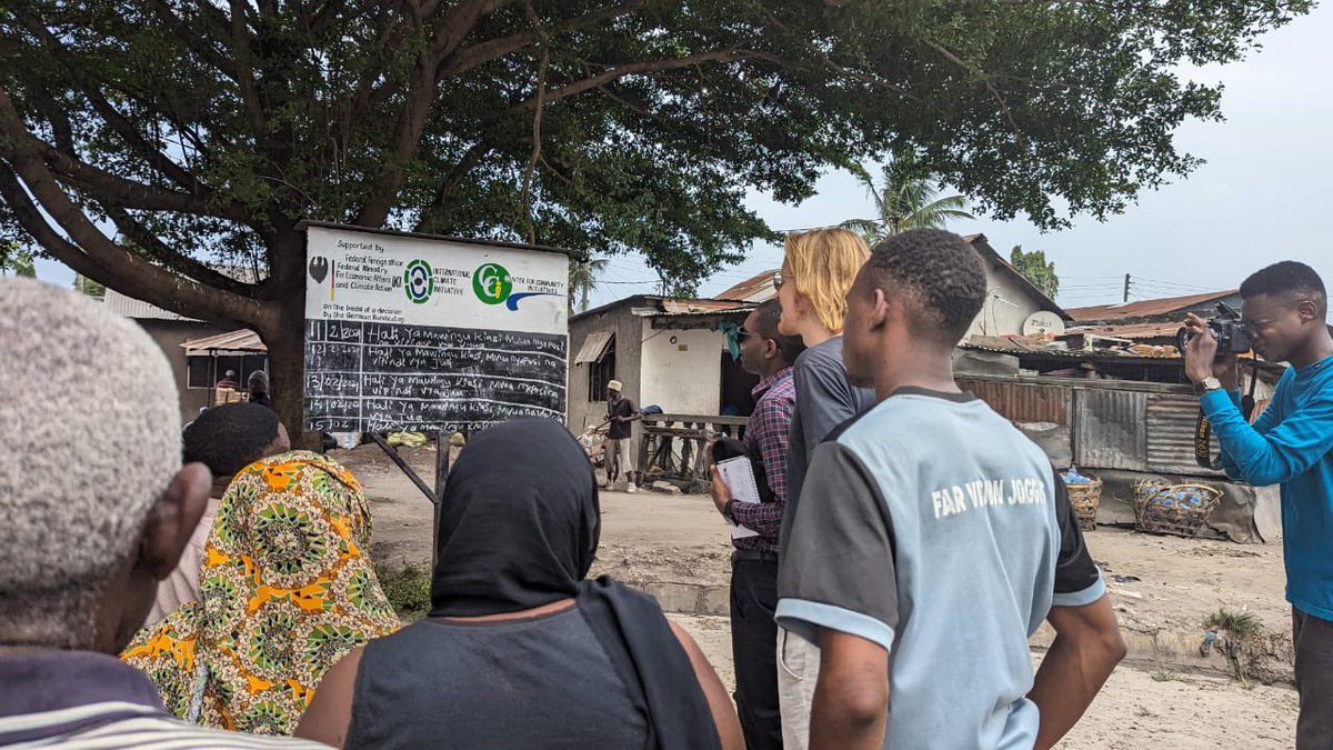 ccitanzania's tweet photo. The DARAJA project team in Kombo settlement, ensuring accurate forecasts via SMS and #weatherinformation board. #flooding #Adaptation #Tanzania #IKISmallGrants https://t.co/8Nc9rhPZak