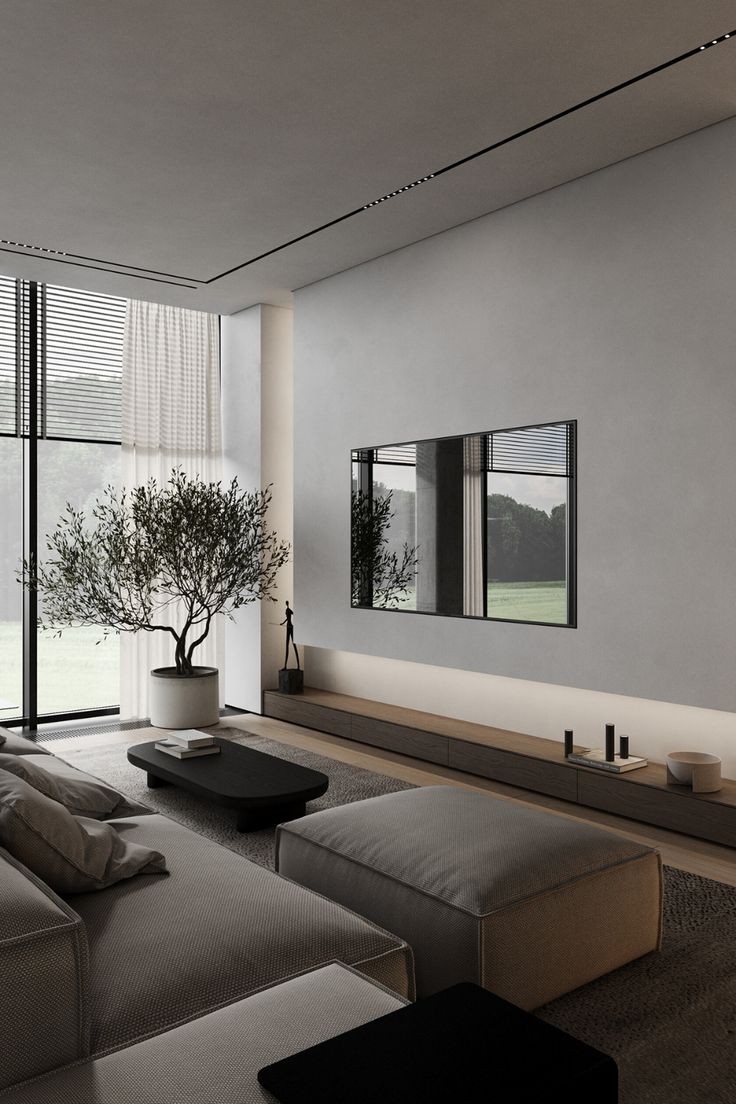 85. The image features a modern living room with a large couch, a coffee table, and a large window with a view of the outdoors. The room is well-lit and has a minimalist design, creating a clean and comfortable atmosphere. #ai #imagedescription