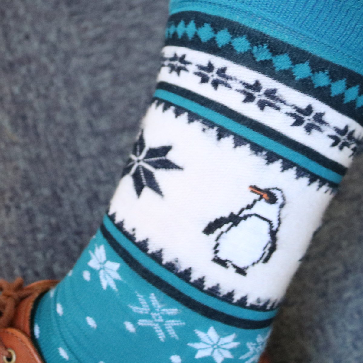 There's some brilliant #Polar themed clothing at SPRI today! A king #penguin tie👔, cetacean jumper🐳, and penguin socks🐧! #clothes #winterfashion #outfits #winterclothes
