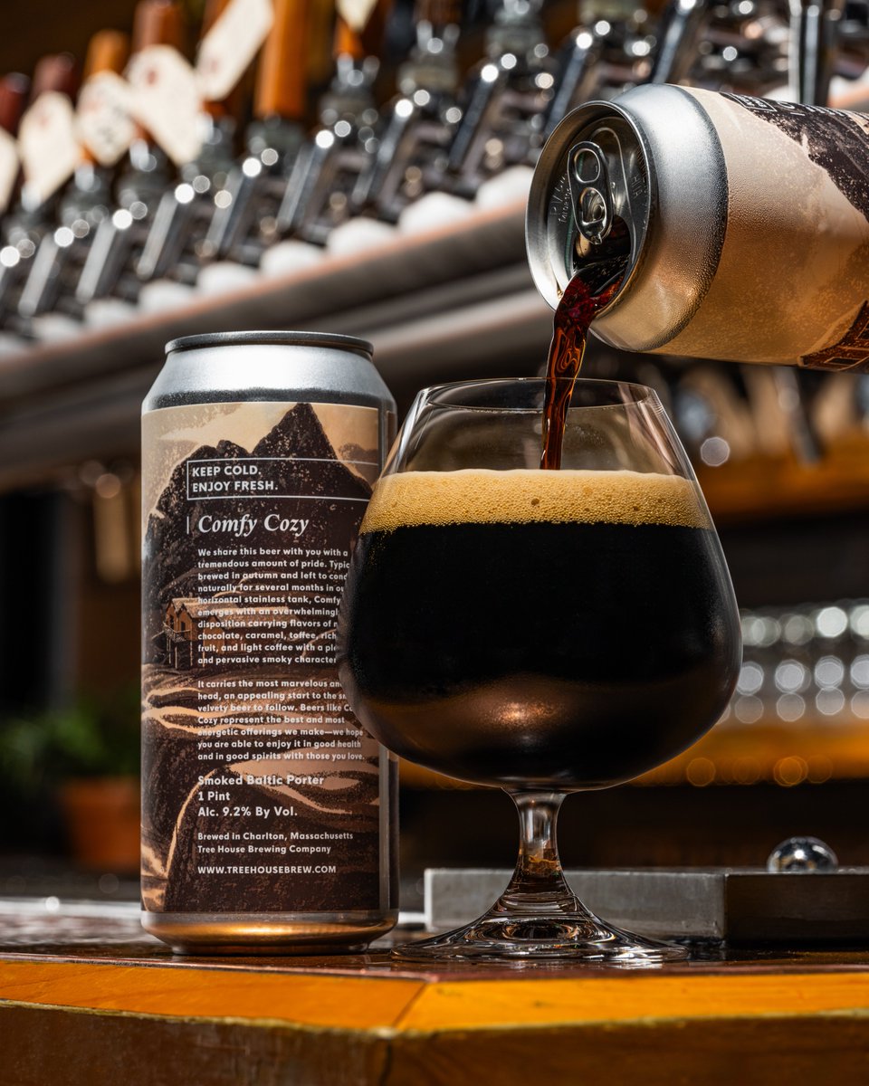 TreeHouseBrewCo's tweet photo. The world needs more smoked baltic porter, and we are out here doing our part with Comfy Cozy!

Brewed in autumn and left to condition naturally in our horizontal stainless tank for several months, Comfy Cozy emerges with an overwhelmingly smooth disposition carrying flavors of molten chocolate, caramel, toffee, rich dark fruit, and light coffee with a pleasant and pervasive smoky character.

It carries the marvelous and dense head, an appealing start to the smooth, velvety beer to follow. Beers like Comfy Cozy represent our best and most energetic offerings—we hope you can enjoy it in good health and in good spirits with those you love.

Keep it cold and be rewarded with its evolution in the can for years.