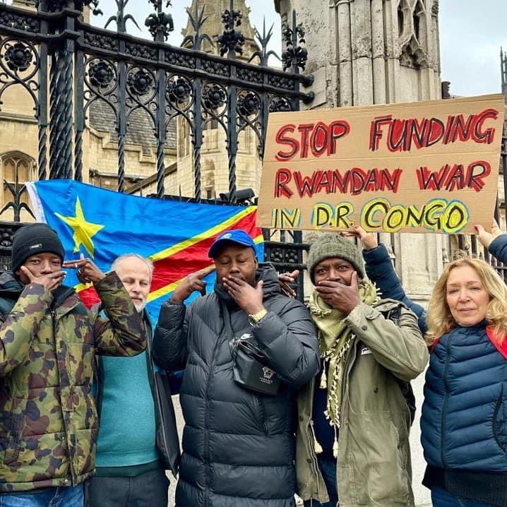 Joe__Bassey's tweet photo. STOP FUNDING RWANDA WAR IN D.R.CONGO

Extinction Rebellion's House of Commons protest reveals the UK government’s role in exploitation and violence around resources in Africa.

What are the dangerous and shadowy links between the UK Government’s Rwanda flights and a heartbreaking war over resources in Africa that is also fuelling the climate crisis and destroying vital ecosystems?

Extinction Rebellion activists answered that complex question as they staged a protest in the House of Commons pretending to hold guns to their heads and unfurling a banner saying: 'STOP FUNDING RWANDA WAR IN D.R. CONGO.'

The activists drew public attention to the causes and impacts of a conflict that has raged in the Democratic Republic of Congo (DRC) for over three decades between armed gangs and militias fighting for control of an estimated $24 trillion in natural resources.

Their actions served as a plea for the world to realise that Goma, one of the main cities in eastern DRC, is just days from being captured by a violent militia group.

 Vast caches of copper, diamonds, tantalum, tin, gold, and more than 63% of global cobalt production are the prize that the gangs use to get rich by selling them to the UK and other rich developed nations to produce mobile phones, computers, batteries and increasingly for renewable energy technologies.

The fighting has displaced more than 10 million people, triggered indiscriminate killings and mass rape, and seen militia armies ransack the country’s rainforests with illegal logging and poaching, damaging the wild places that absorb huge amounts of the carbon dioxide and slow down the climate and ecological emergency.

Dig a little deeper, say the activists, and you discover that one of the worst militias, the M23, committing murder and ecological destruction across huge areas of the DRC, is funded by the Rwandan government – who are in turn receiving funding from the UK government.

Copied 

#CongoGenocide  #CongoIsBleeding