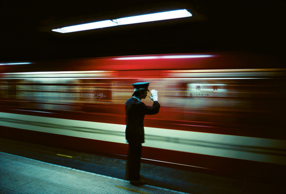 Image of the Day 📷⁠ Platform Conductor, Ikebukuro, Tokyo, 1976 // Photo: © Greg Girard