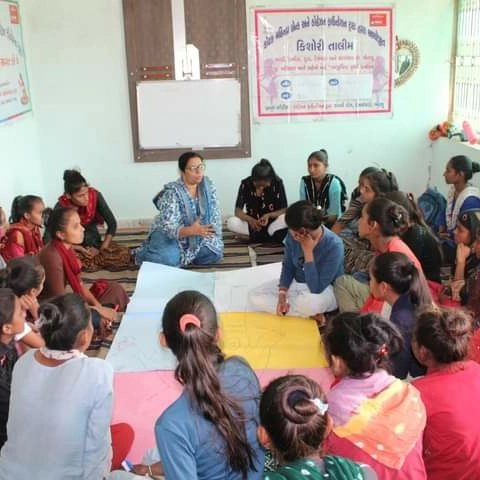 Empowering adolescent girls through group training sessions focused on various like skills.