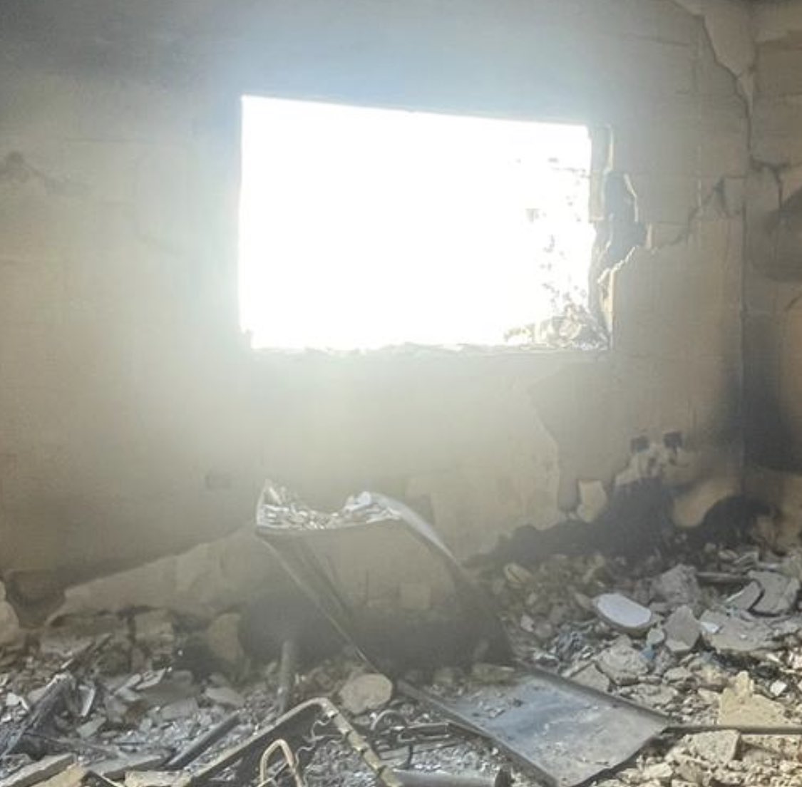 My window back home, where Tom loved to sit and watch me work.. before &amp; after Israel’s carpet-bombing of my neighborhood in Gaza City