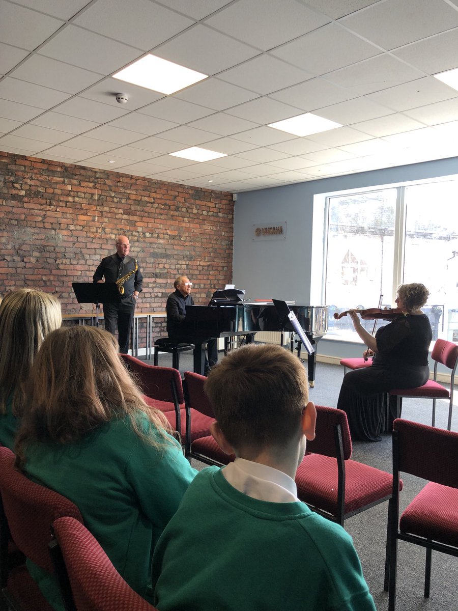 Students from ⁦@NCEA_JamesKnott⁩ & ⁦@NCEA_TB_Primary⁩ have visited the Yamaha Music School this week to watch the Eclectic Lite Trio perform. It was inspirational to see professional musicians playing the instruments we are learning.