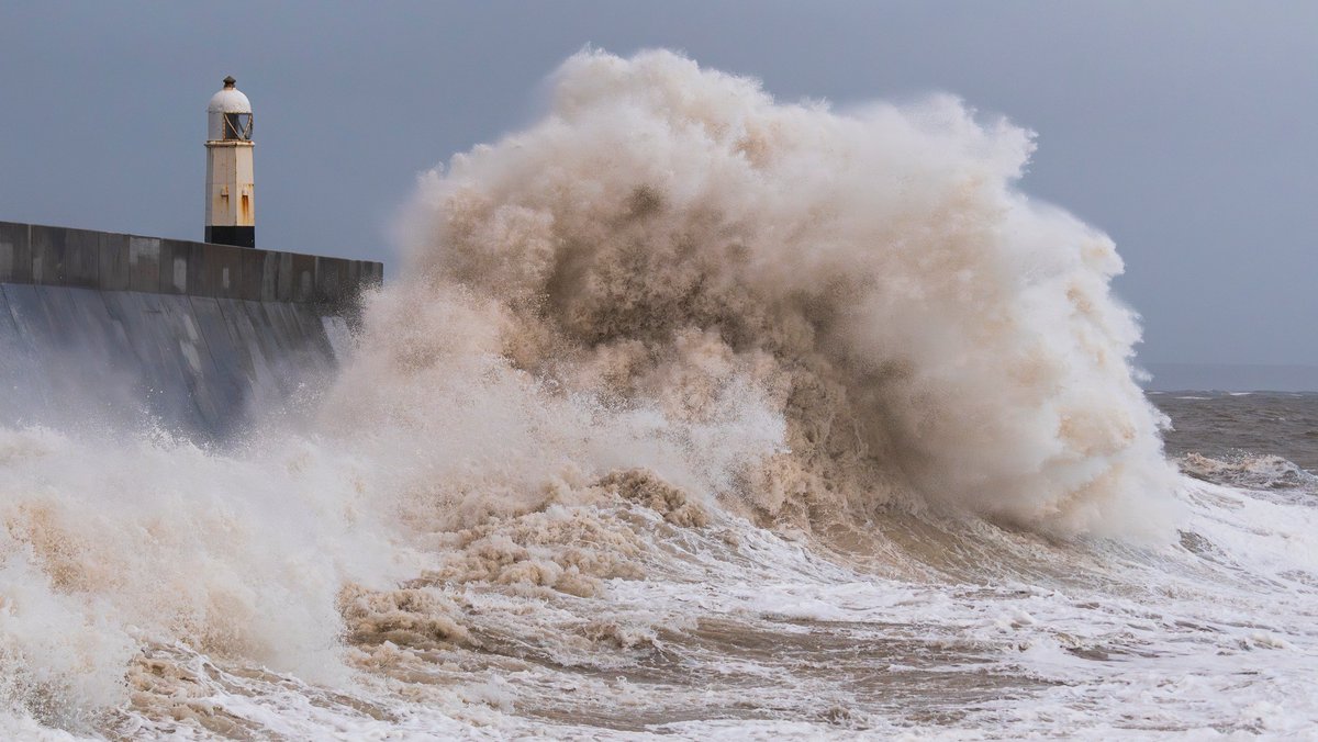 The breathtaking view of the waves crashing against the sea wall at Porthcawl never fails to mesmerise. 🌊 Are you ready to wave goodbye to this iconic view, and swap storms for spring sunshine? ☀️ 📷 dazsphotography1 #stormyseas #waves #porthcawl #lighthouse #bigwaves