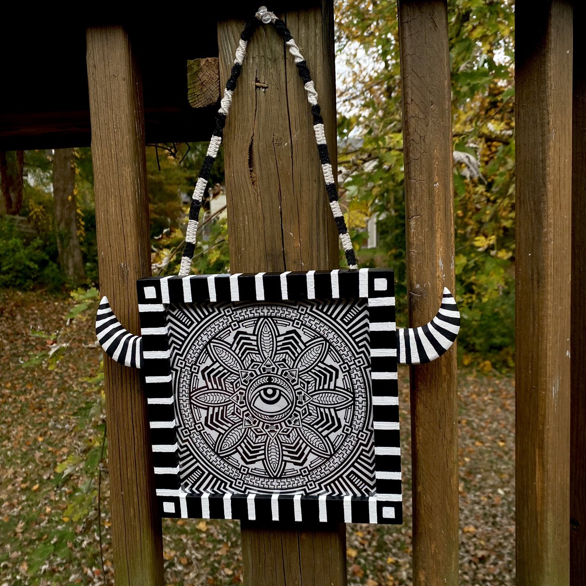 Check out this piece I made  in October 2023. Hand drawn on 8x8 bristol board w/ micron pens.  Found a cheap wooden frame to funk up. Carved lil wooden horns to add on the sides.  Painted it all. Then wrapped up sum hemp cord.  Fun piece. #psychedelicart #illusrtation