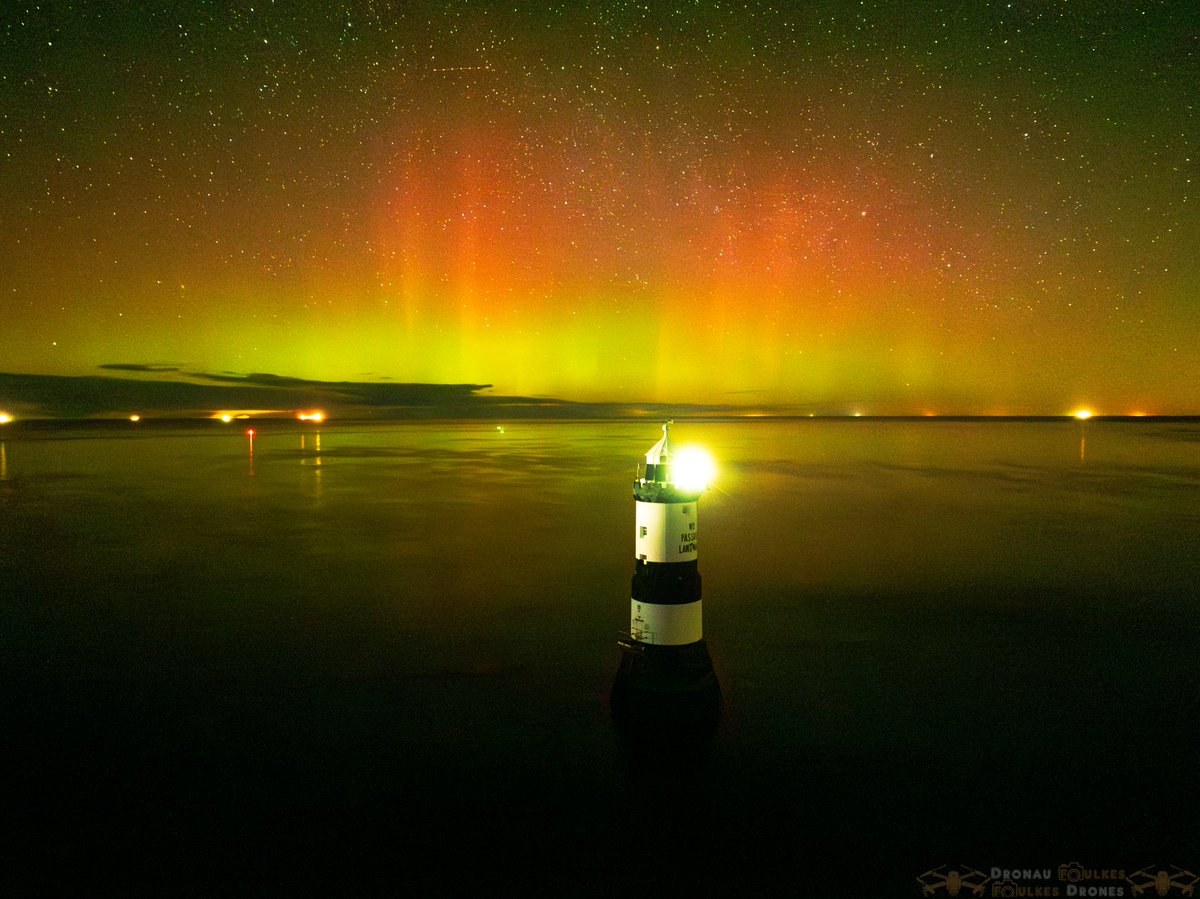 Last night's Aurora Borealis, taken by drone from Penmon point in Anglesey, north Wales. 
<a href="/Ruth_ITV/">Ruth_TV</a>
<a href="/DerekTheWeather/">Derek Brockway - weatherman</a> <a href="/ITVWales/">ITV Wales News</a> <a href="/S4Ctywydd/">S4C Tywydd</a> <a href="/ItsYourWales/">It's Your Wales</a> <a href="/ChrisPage90/">Chris Page - Weatherman</a> <a href="/carolvorders/">Carol Vorderman</a> <a href="/MillardWill/">Will Millard</a> <a href="/ChrisPage90/">Chris Page - Weatherman</a> <a href="/metoffice/">Met Office</a> <a href="/ywasgS4Cpress/">S4C Y Wasg/Press</a> <a href="/carolkirkwood/">Carol Kirkwood</a> <a href="/AngleseyHist/">Anglesey History</a> <a href="/StormHour/">#StormHour</a>