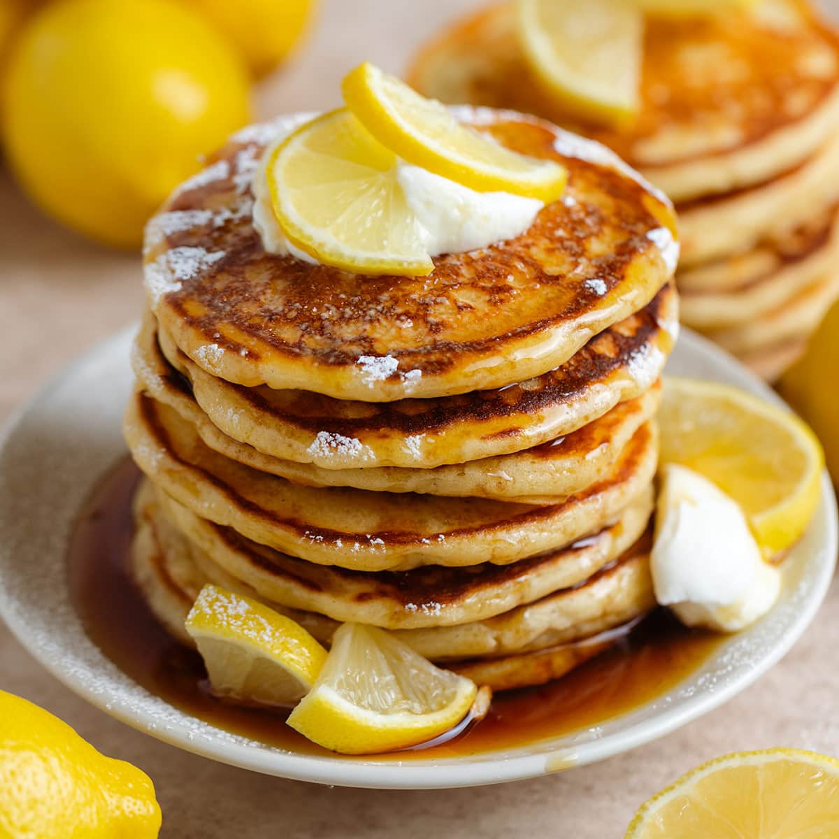 These Lemon Pancakes are light, fluffy, and packed with bright lemon flavor without being tart. They're freezer-friendly and great for meal prep! #lemonpancakes thehealthfulideas.com/lemon-pancakes…