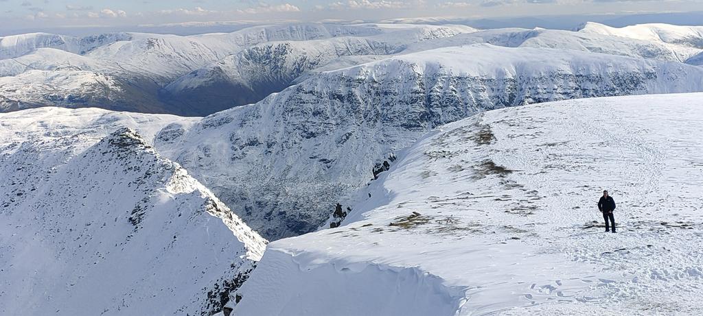 Magical summit views from #Helvellyn on another spectacular winters day. Crampons / microspikes & an ice axe essential for anyone venturing above the snowline as even the easiest paths are becoming icy #summitsafely #beadventuresmart Zac