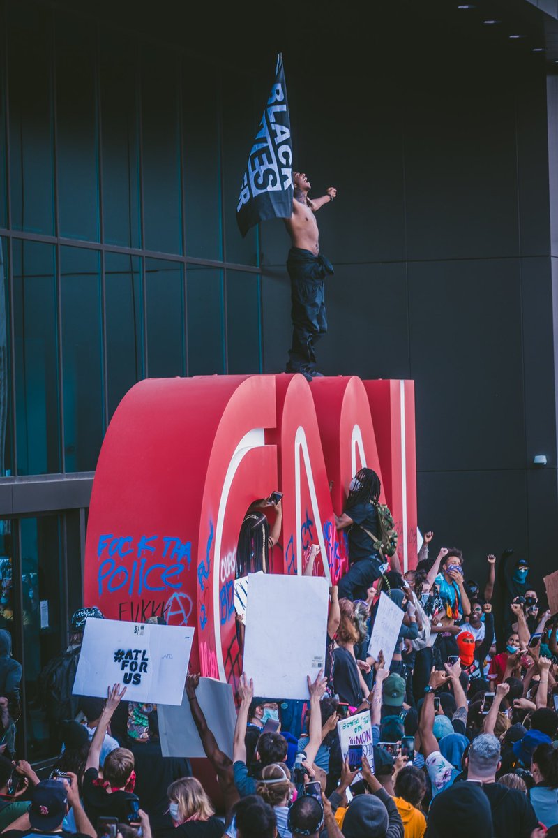 The iconic CNN sign in downtown Atlanta, highlighting the former headquarters for the cable news network, has officially been removed this morning. The end of an era. Photo: Black Lives Matter protest following the murder of George Floyd, 2020.