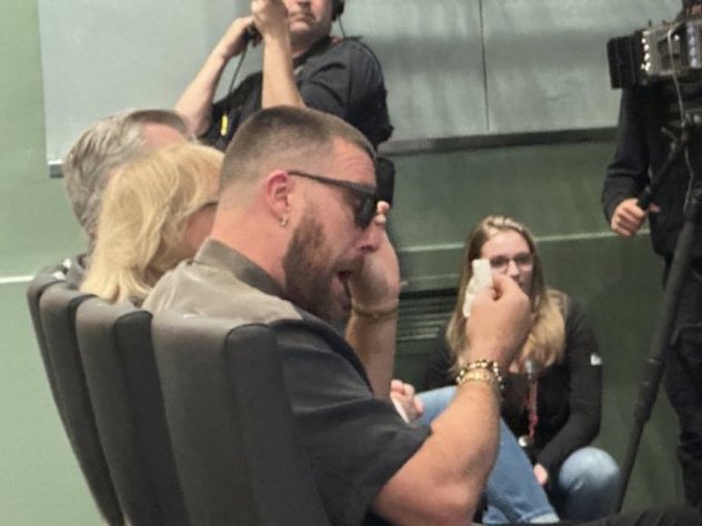 POV me in work cubicle watching a man retire from football