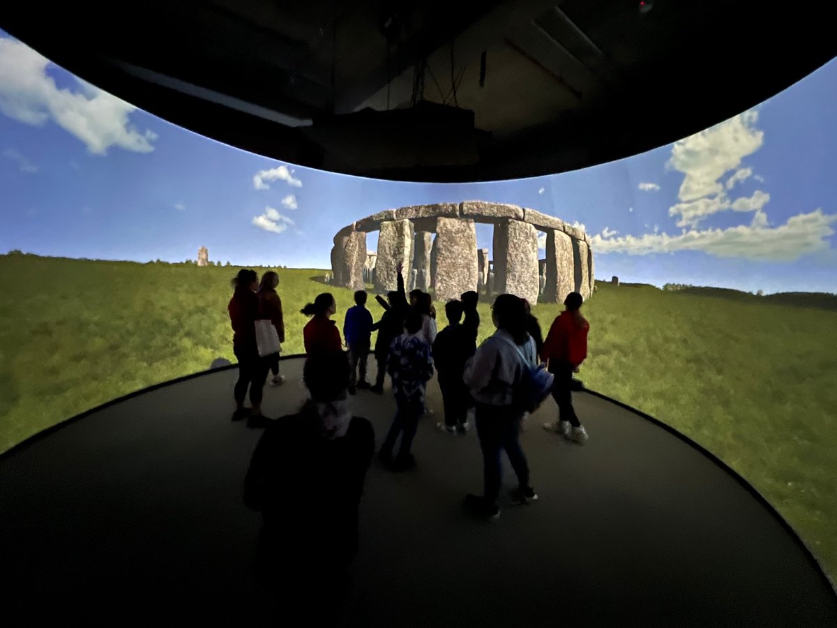 Muncie Community Schools SMART programs visits the IDIA Lab VR CAVE immersion theater. Touring our interactive Virtual Stonehenge app. buff.ly/3V4iyST