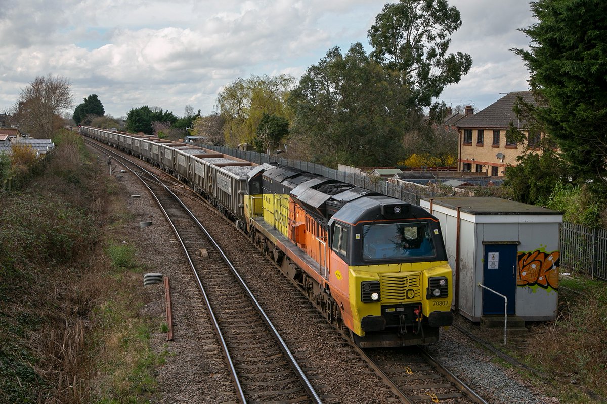 Colas Class 70 No.70802 at March West Jct on 4th March 2024 with 6L40 08:40 Longport-Whitemoor ballast.The train comprised of 22 Land Recovery JNA Megabox wagons.#March #Class70