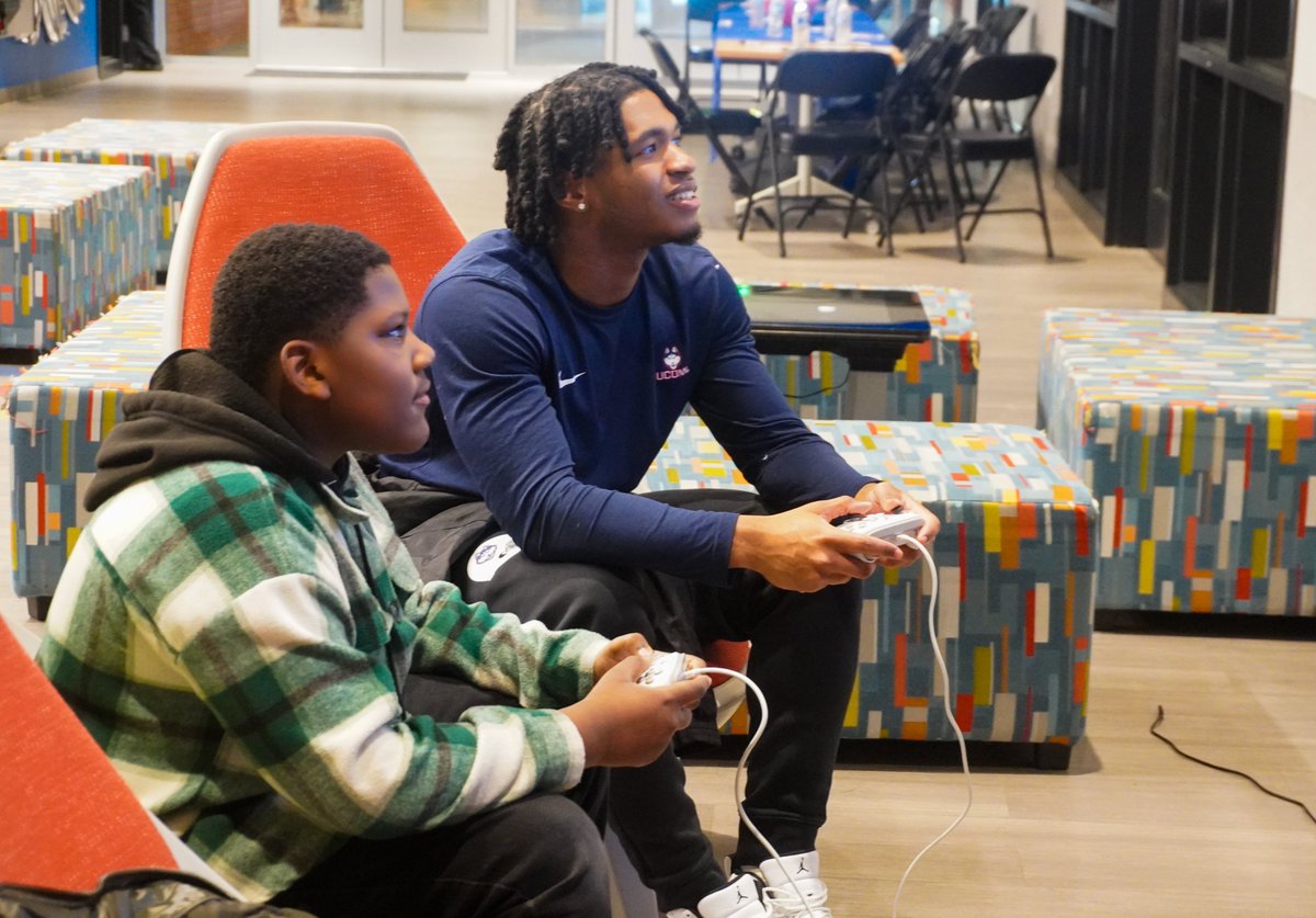The Huskies are in the house! Thanks to @BleedingBlueNIL members of the UConn Football team traded the gridiron for the gaming chair tonight. They connected with our Members over video games, ping pong and pool. Thanks to @frankpepepizza for providing the pizza for this party!