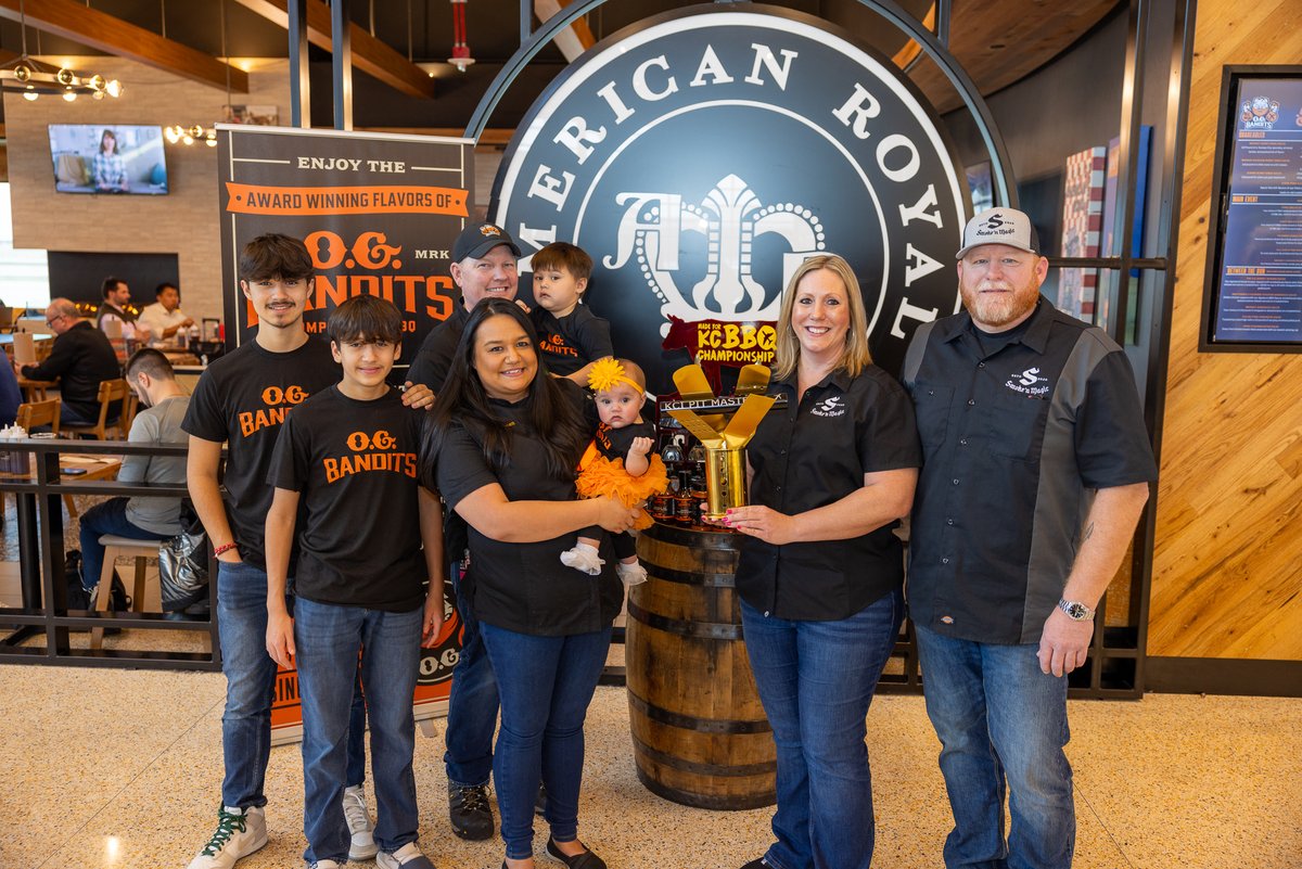 Fly_KansasCity's tweet photo. O.G. Bandits BBQ, the winner of the 2nd Made for Kansas City BBQ Championship, celebrated the start of a 1-year showcase at the airport with an official passing of the barbecue trophy from the 1st winner, Smoke 'n Magic. 

https://t.co/pez4ReM2xT https://t.co/lMhH32B8a9