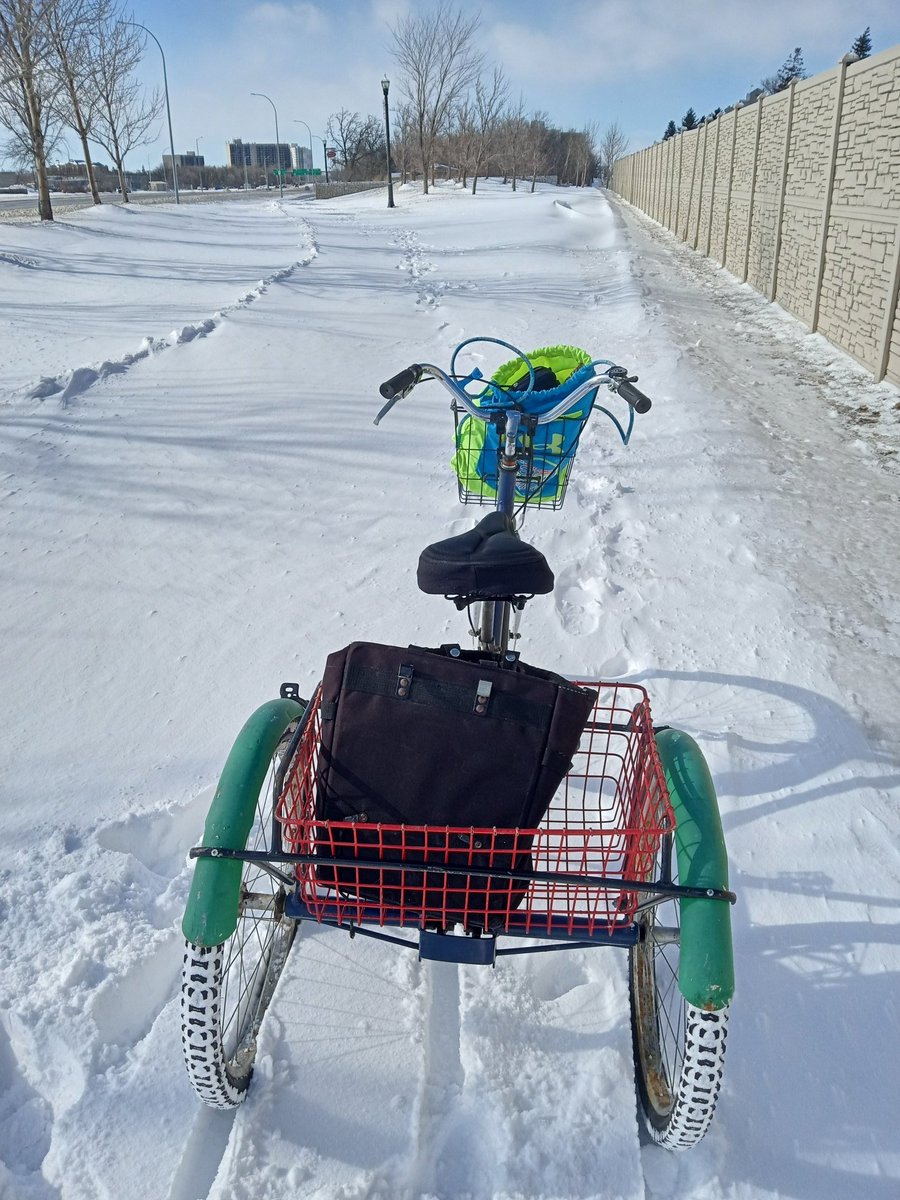 Lots of pushing my trike on the Active Transportation Commute on unplowed Chief Peguis Trail. Got stuck several times between Rothesay & Henderson. @cityofwinnipeg @chriscrond @chloejuleann