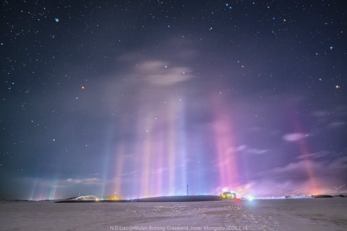 Light Pillars Over Inner Mongolia

What's happening across that field? Pictured here are not auroras but nearby light pillars, a phenomenon typically much closer. In most places on Earth, a lucky viewer can see a Sun pillar, a column of light appearing to extend up from the Sun