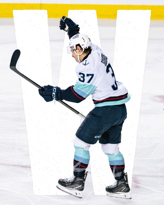 Graphic of Yanni celebrating a goal with a giant W super imposed behind him