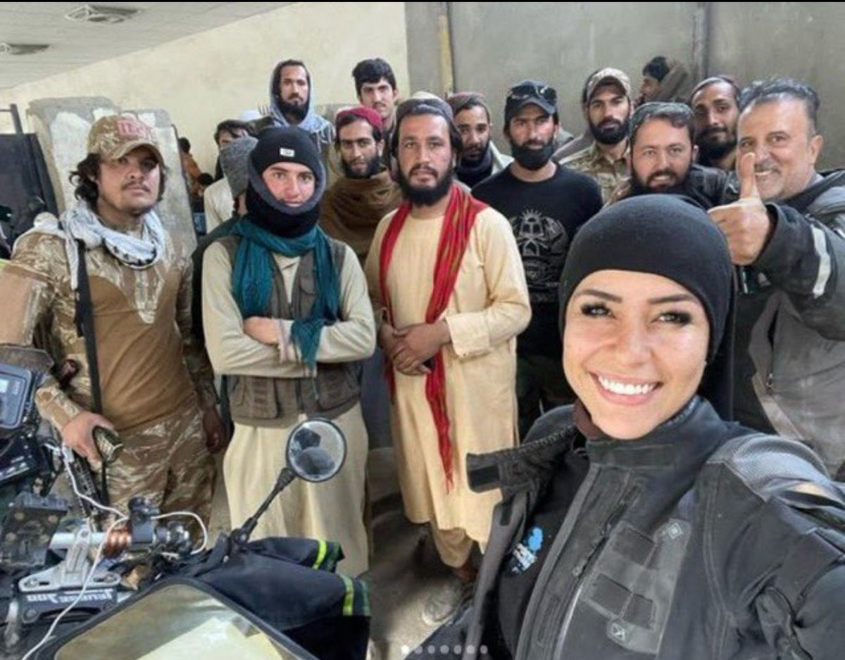 BRAZILIAN WOMAN TAKING A SELFIE AND UNHARMED WITH THE TALIBAN But she was gang raped by 7 men in India.