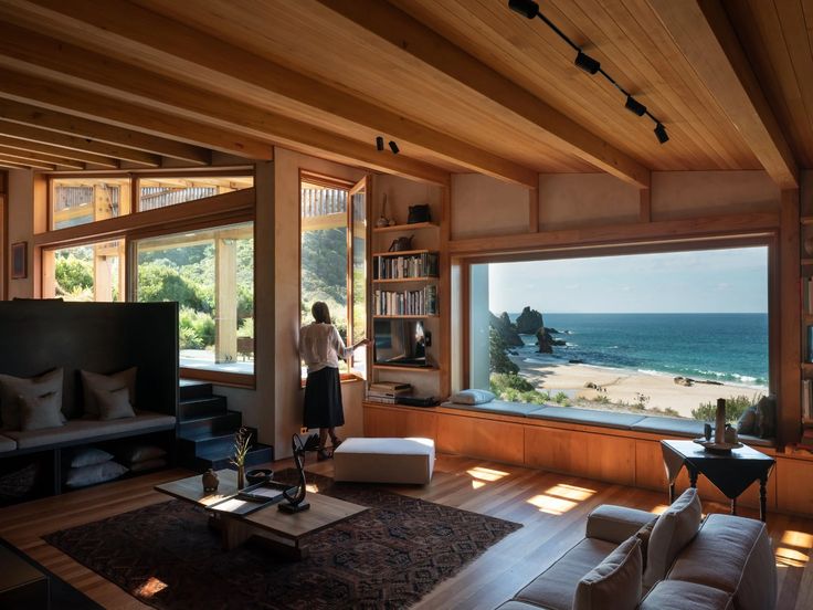 Windows frame a gorgeous view of Otama Beach, Coromandel Peninsula, New Zealand in this rustic and sun-draped home.

See more at pinterest.com/GranadaHomeInt…