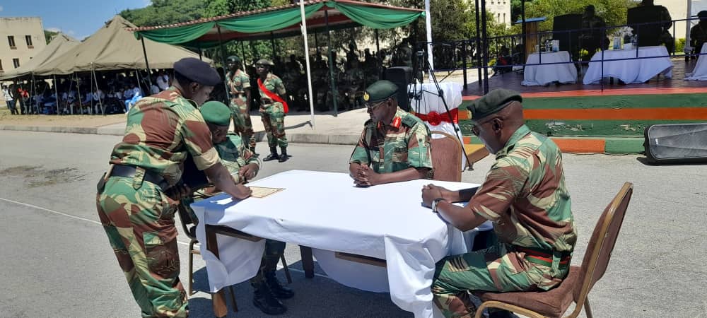 The Commander of the Zimbabwe National Army Lieutenant General Anselem Sanyatwe witnesses the official handover-takeover signing ceremony between the outgoing Commander 4 Infantry Brigade Brigadier General Ephias Mahachi and the incoming Commander Brigadier General Cephas Gurira…