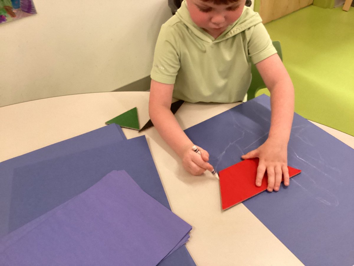 We are using blue paper, white crayons, and shapes to make blueprints today!@NKCEarlyed