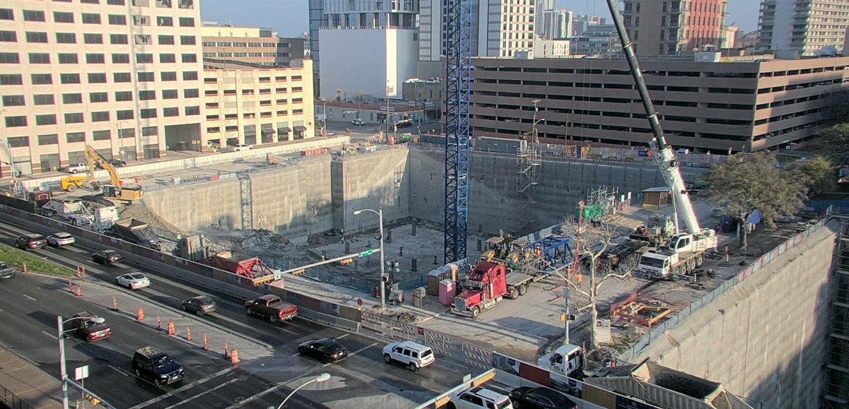 TheATX1's tweet image. The base for the second of three tower cranes for the Capitol Complex expansion project arrived on site this morning.  The crane is scheduled to go up 3/22 to 3/24.