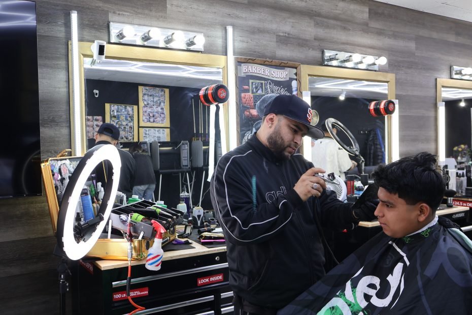 At Ana’s Salon, there are ballots & there are barbers, but the two don’t seem to mix. The barbers—from Peru, Colombia, & Mexico—can't vote, & the men getting haircuts don't seem inclined to—till they see the voters trickling in. I will vote, said Arturo. “Sería la primera vez.'