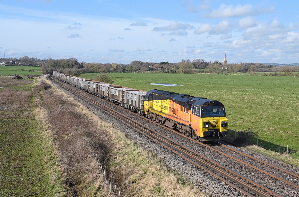 A rare visitor to the Melton line. 70802 is seen just east of Kirby Bellars on 04/03/24 with 6L40 Longport to Lowestoft Sidings, conveying reclaimed ballast in Land Recovery JNA-V open box wagons. Land Recovery have recently purchased twelve Class 60 locomotives from DB Cargo UK.