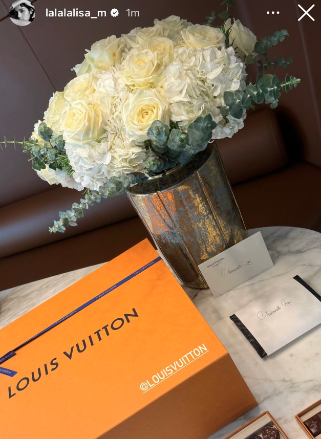 BLACKPINK's Lisa hints on attending the Louis Vuitton show.