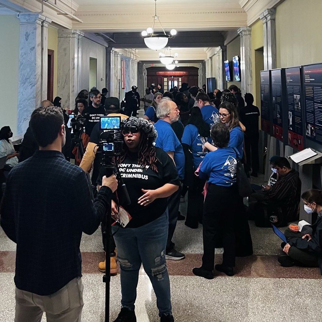 Defund_MPD's tweet image. We have PACKED the DC Council meeting room, hallways, and overflow room to STOP the hyper-racist and carceral #SecureDC (or crimnibus). #UsNotCrimnibus 🔥🚍
@ChmnMendelson @CMBrookePinto @MayorBowser @councilofdc