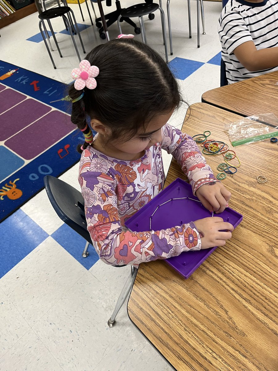 Learning how to identify and describe shapes is so much fun! Such creativity using geoboards! <a href="/centreridgees/">Centre Ridge Rams</a> #creconnections #cresculture