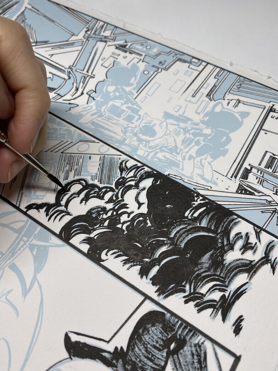 'We still make our comics the old fashioned way. All of our comics are drawn by hand by leading industry artists. While the process is complex, the end result is worth it. Can you identify which page of Ghost Machine #1 is being inked here?'