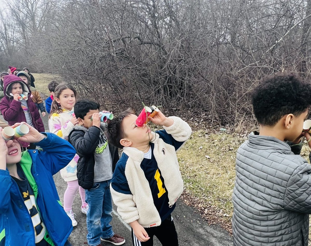 Kindergartners using their “binoculars” to go bird watching. We listened for bird chirping, saw lots of birds flying overhead and in the trees and even saw a nest high up in the tree tops. @TroyUnion