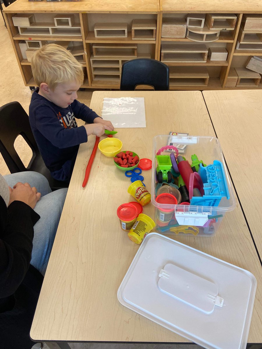 Bryce is playing with playdough during independent free play. He is pretending to make a bowl of pasta by rolling out the play dough and cutting it into equal pieces. To make sure they are the same size, he would line up the first one and cut it to match! So smart!
@EY_uwindsor