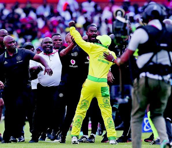 This man just wanted to hug Coach Rhulani, but you know South African media loves propaganda