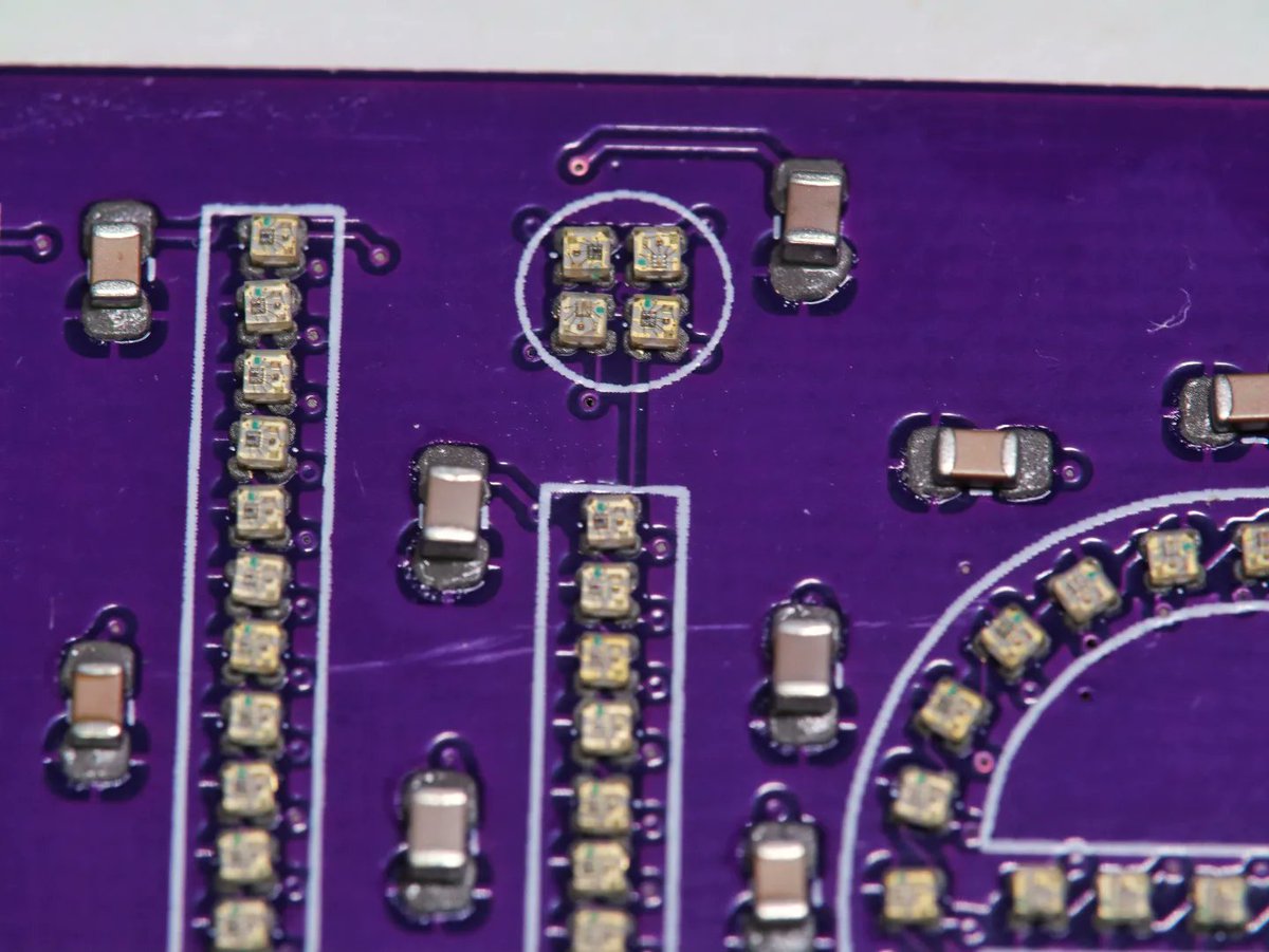 It's a bit hard to believe it, but the first (and hardest) step of getting these custom name badge PCBs functional is complete! It really is hard to understate just how small these components were. Even so, it was weirdly fun and satisfying to place each tiny piece by hand!