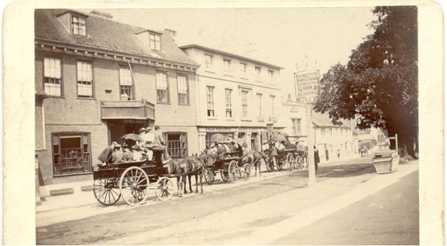 Have you visited our latest exhibition of photographs of towns in the district yet? This old photograph of the Kings Head in Ongar, in 1896 is one of the many images you can see. #Ongar #pubs