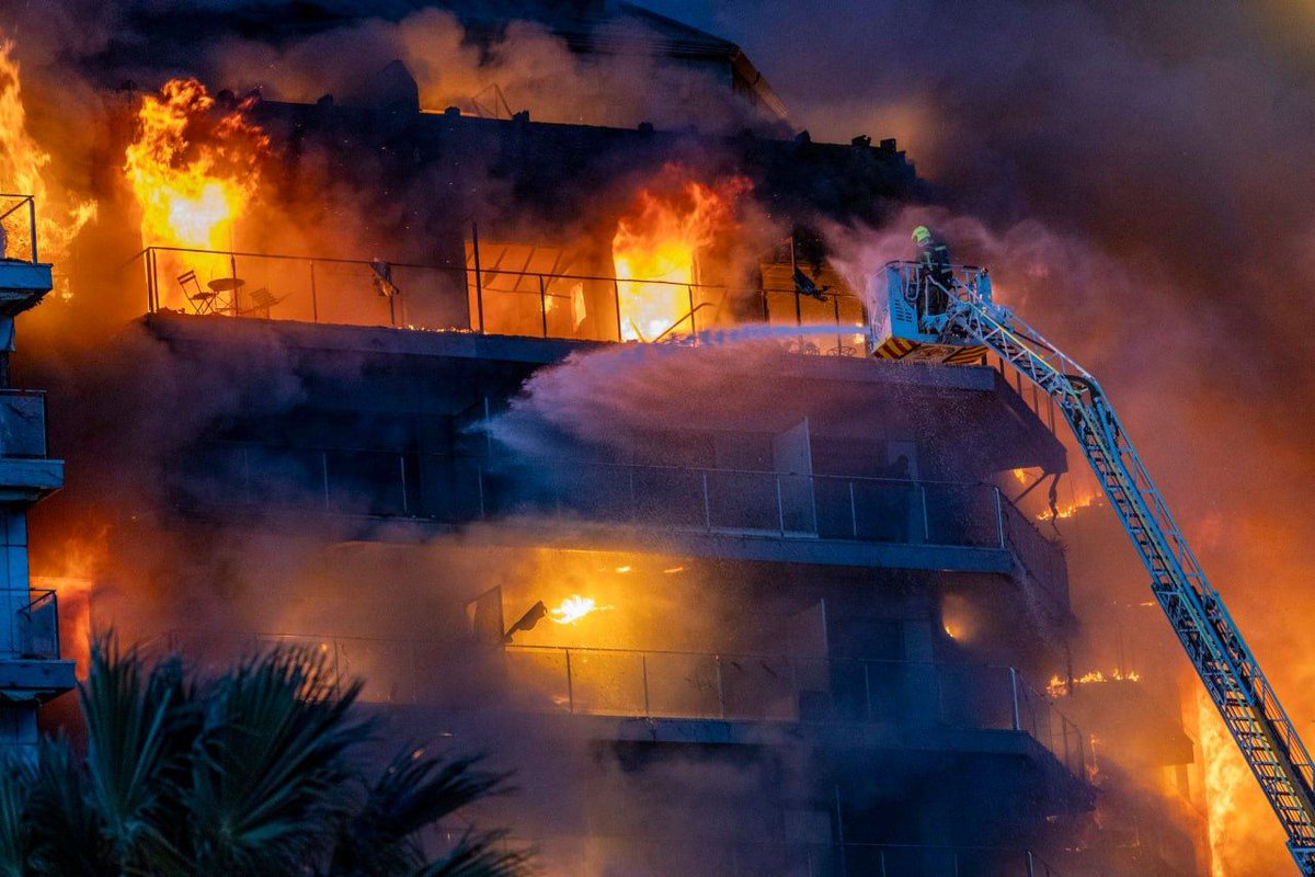 🔥More footage is emerging from Spain as reports confirm a fire has reignited in a high-rise building in Valencia, Spain. The building was previously nearly destroyed by flames, adding to the urgency of the situation. #valenciafire #staysafe