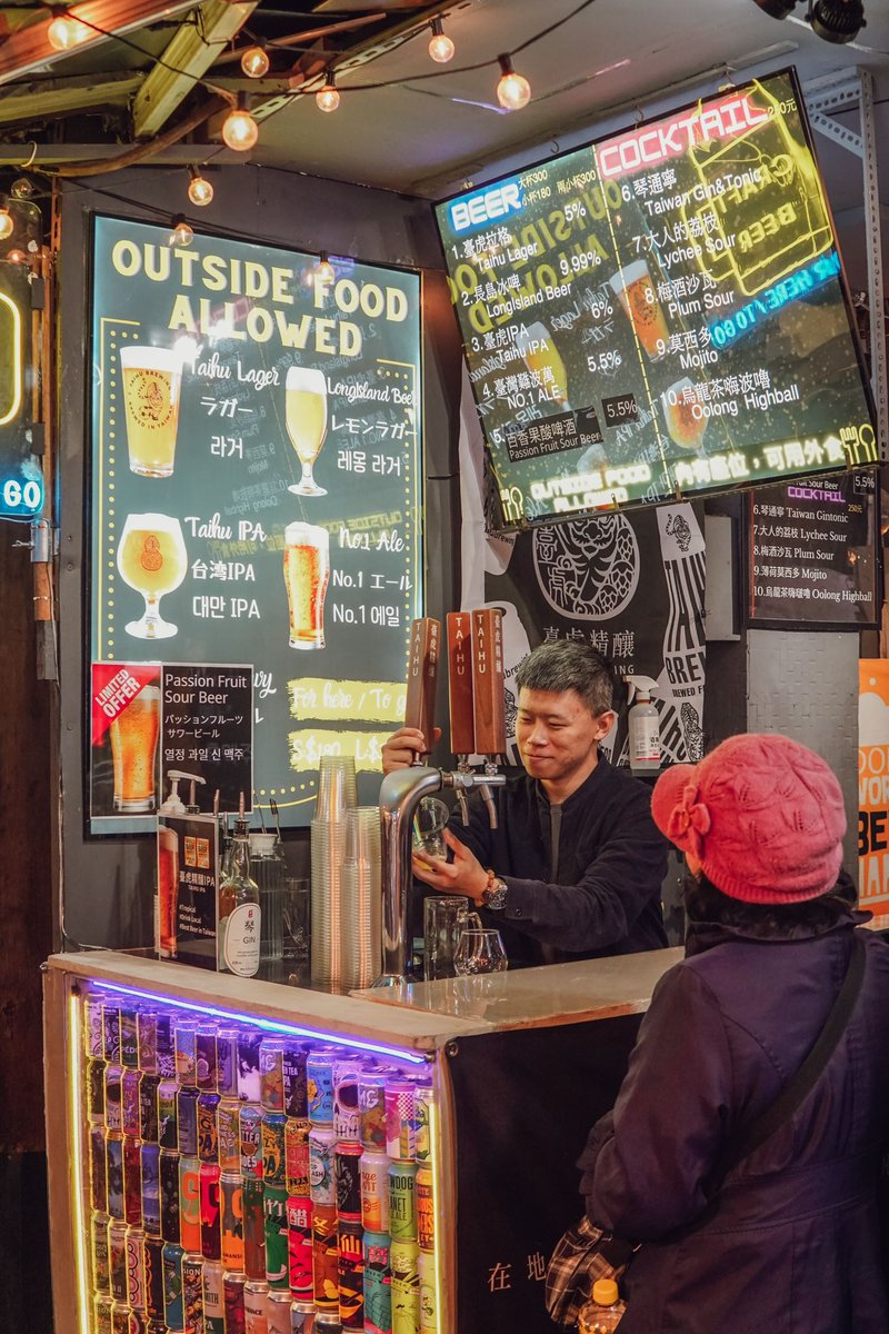 brewsandbeers's tweet photo. Time for a beer at ...checks notes...'Time Beer' bar at Raohe Night Market in #Taipei  - we spotted this choice craft beer bar tonight serving @taihubrewing with a nice look out over the market. Really looking forward to exploring the #Taiwan #CraftBeer scene! https://t.co/kJsco5ZqsD