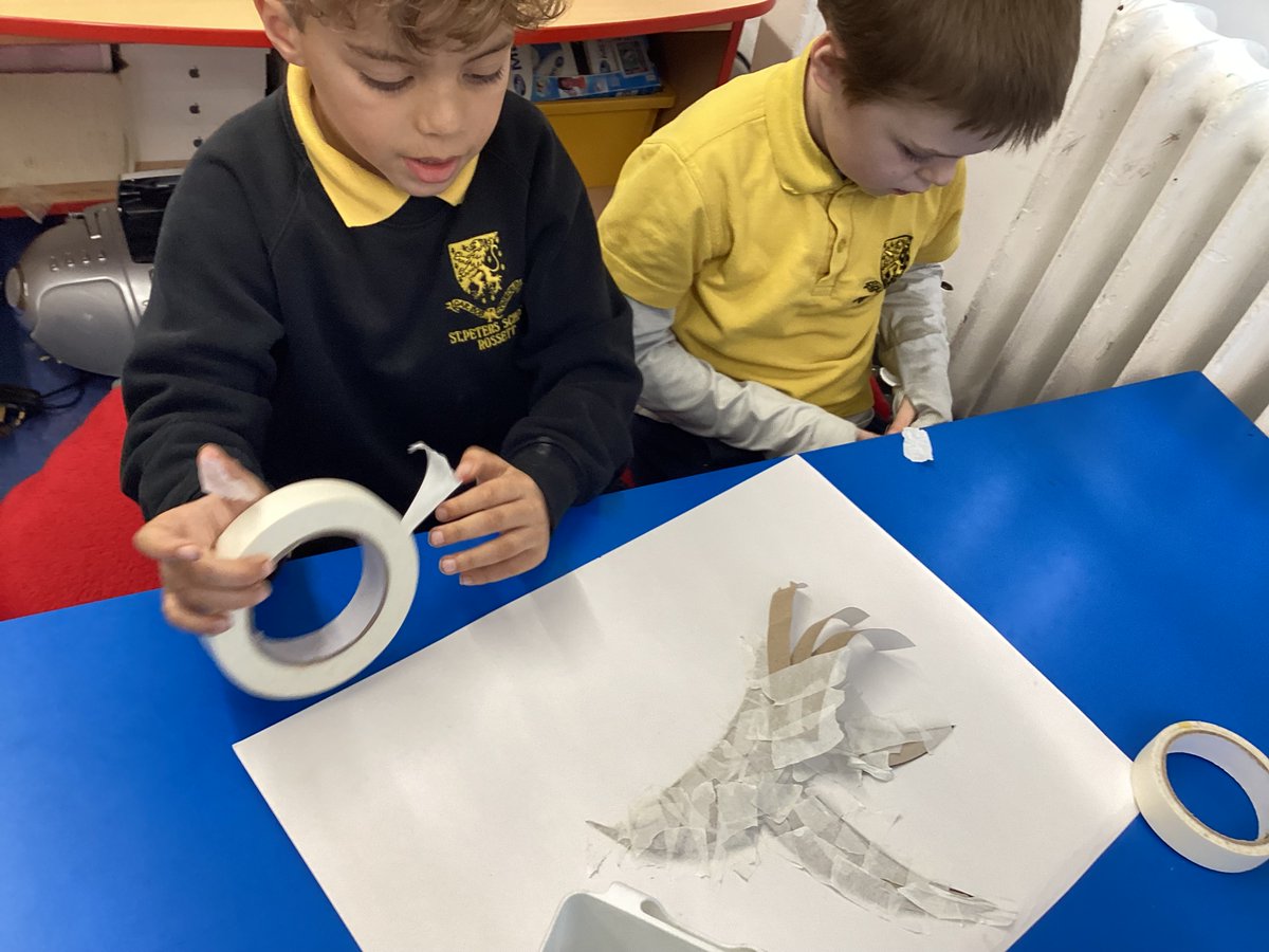 Working together to turn cardboard tubes into birds.@theartcriminal @DarrellWakelam @Arts_Wales_ @Artsmarkaward @theartsinschool