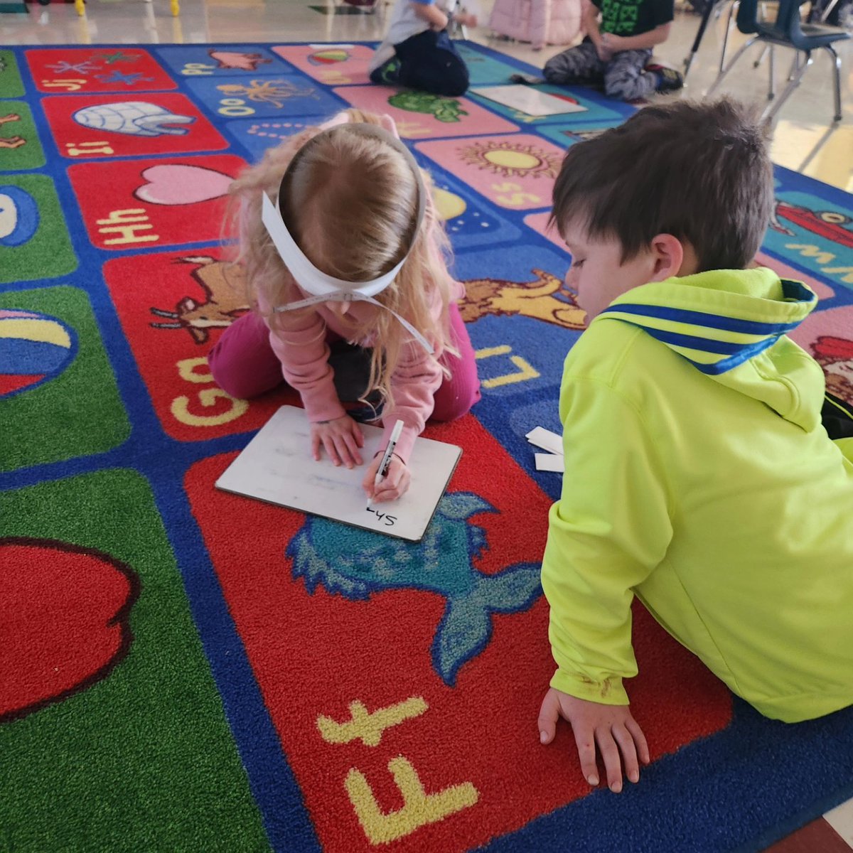 Playing headbands and practicing our reading and writing! #wearewentzville #gtegators #wsdlearns