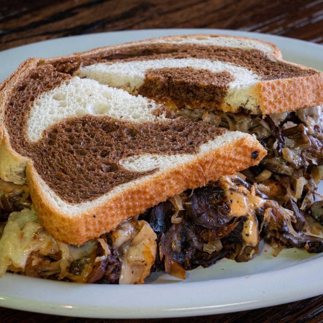 Leap into Lent with our Veggie Reuben: a sinfully good twist that's all treat, no guilt! 🌿🍞 'Lettuce pray for another bite!' says everyone. #VeggieDelight #LentenTreats