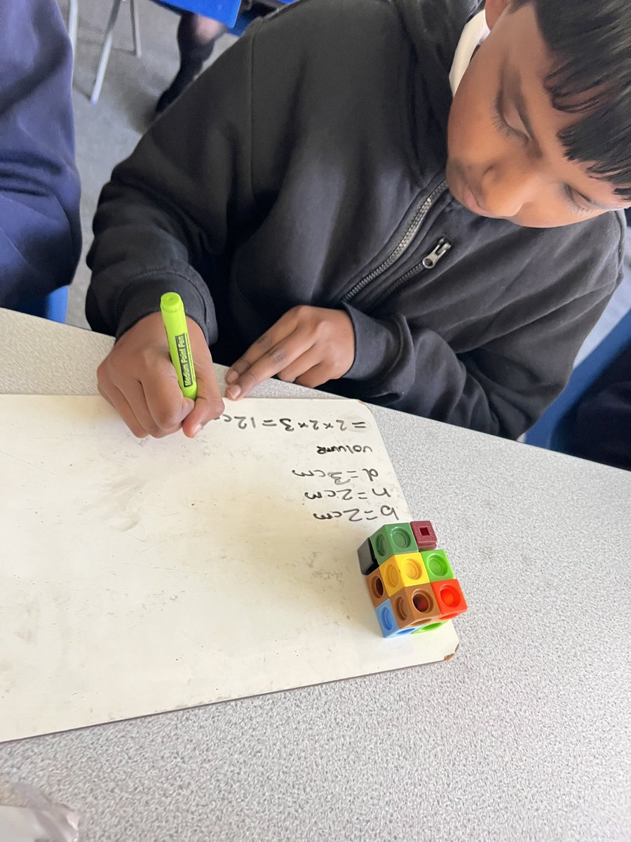 BrookfieldSM3's tweet photo. Year 6 mathematicians have leveled up!  They're now whizzes at finding the volume of 3D shapes, even tricky ones!  Cubes are their secret weapon, helping them break down composite shapes into bite-sized pieces.#mathmagicians #geometrygems #WeAreLeo @LEO_maths @LEOacademies https://t.co/UGEQOl17Sa