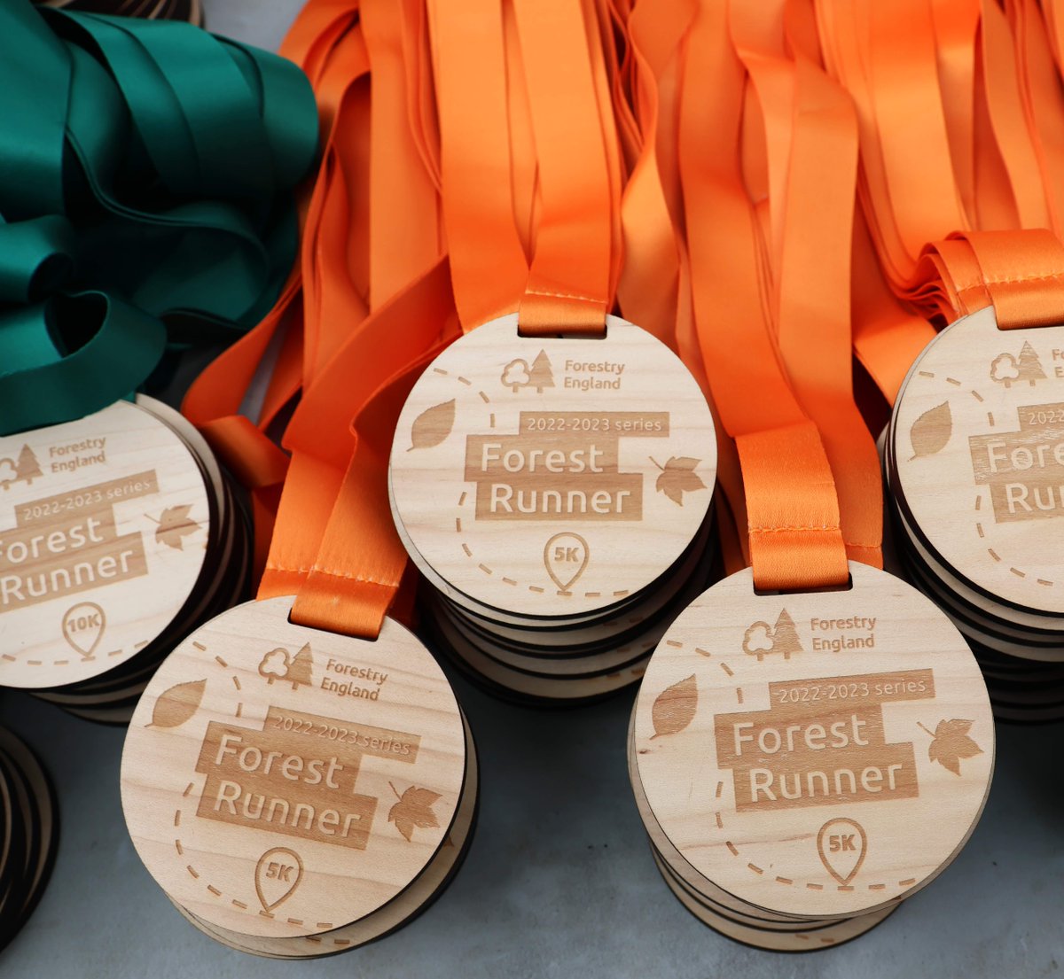 aliceholtforest's tweet photo. The final preparations are underway, we can’t wait to welcome runners back to Alice Holt Forest for this year’s Forest Runner event! Everyone’s a winner - each participant will take home a wooden medal this Sunday! #ForestRunner #TrailRunning #Run1000Miles #MerrellEU https://t.co/Zo4edwL7NB