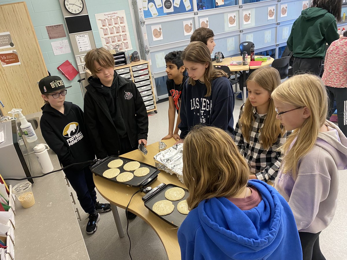 haleywach's tweet photo. Students took turns mixing batter, pouring out pancake mix and flipping them as we made over 100 pancakes this morning! Then we got to enjoy them with our grade 1 buddies 🥞❤️ #SageCreekLRSD https://t.co/f5dLcJitQf