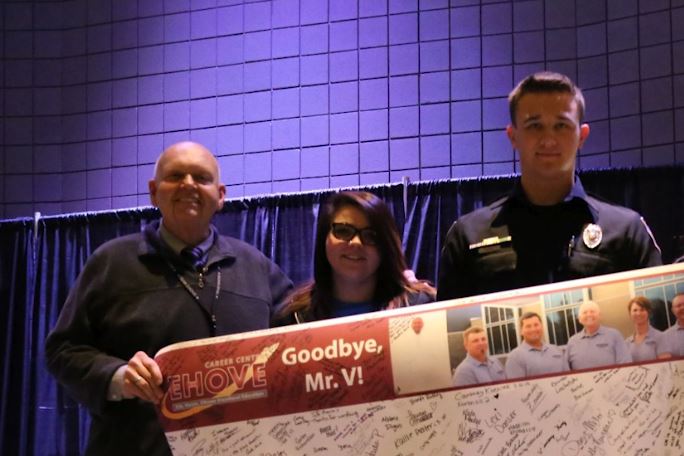 4WARDproject's tweet image. Eric's high school principal Dale VanLerberghe hid rock # 24-021 by Keesler Air Force Base at Biloxi National Cemetery in Biloxi, Mississippi this week.  Because Mr. V always made Eric laugh, we added a photo we happen to have of them together. #4EricWard #4WARDproject #end22aday