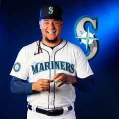 Photo of Luis Castillo smiling during photo day.