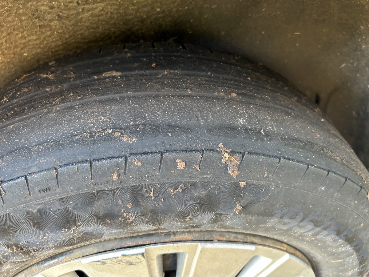 Bald rear tyre on a Citroen Berlingo